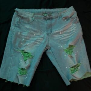 Distressed Denim Shorts with Green Accents
